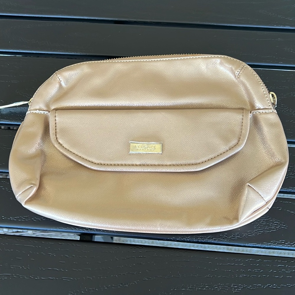 NEW VERSACE PARFUMS GOLD METALLIC BAG. Approx 5x8 inches in size.